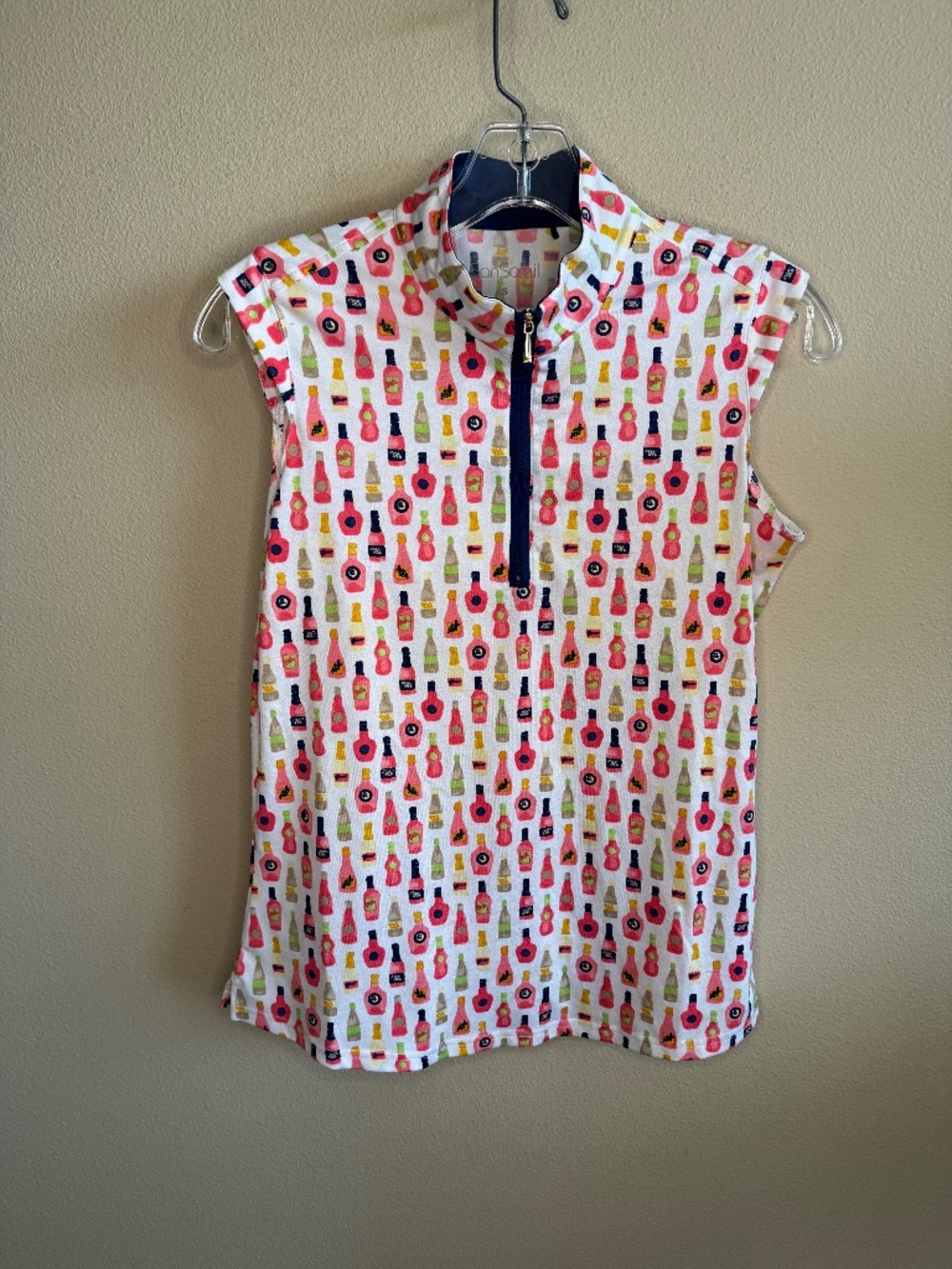 San Soleil sleeveless golf shirt UPF 50, fun bottle print SMALL